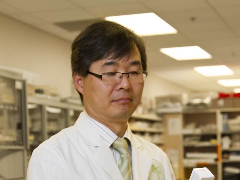 A licensed clinician reviewing care in a clinical setting