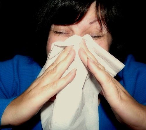 A woman with seasonal allergy symptoms